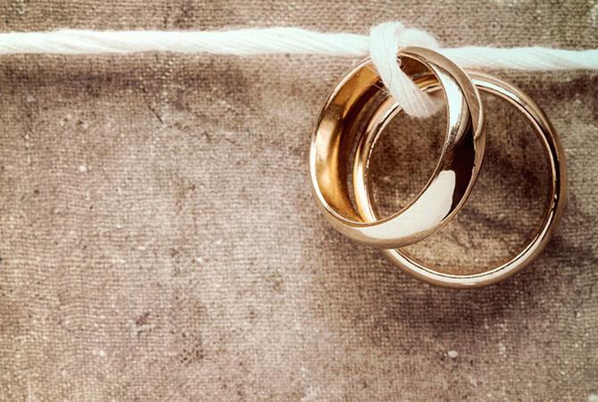 wedding rings tied to string